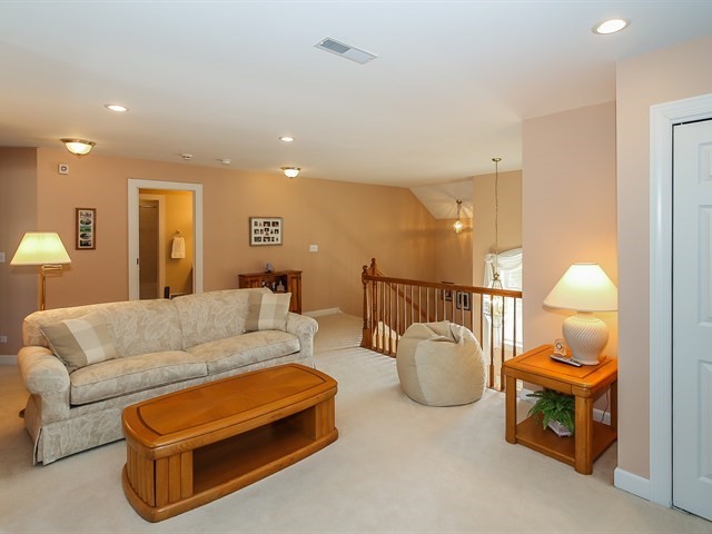 804 Stone Canyon Circle Inverness, IL 60010 - Photo 21 of 30 a living room with furniture and a wooden floor