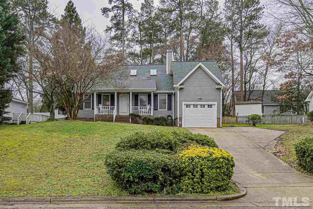 4248 Birmingham Way Raleigh, NC 27604 - Photo 1 of 29 a front view of a house with a garden
