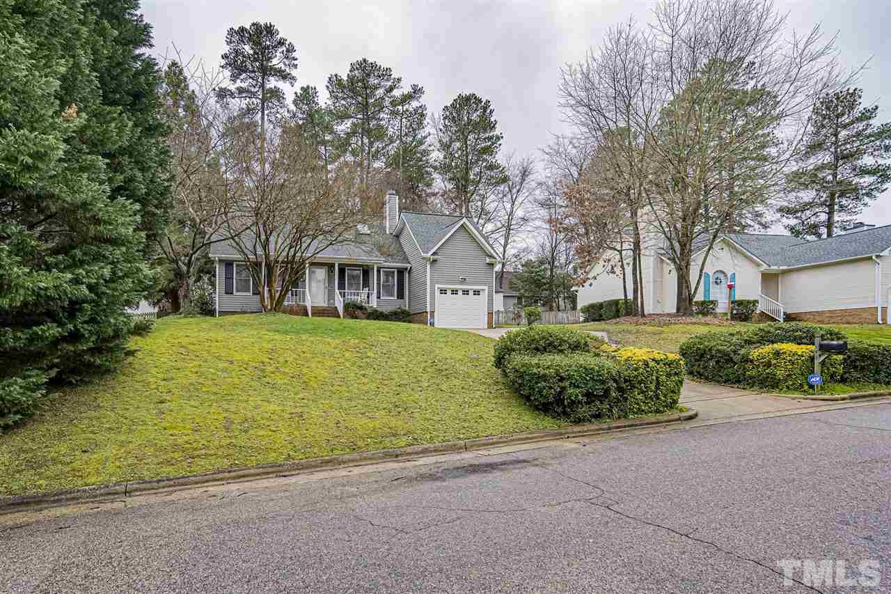 4248 Birmingham Way Raleigh, NC 27604 - Photo 2 of 29 a front view of a house with garden