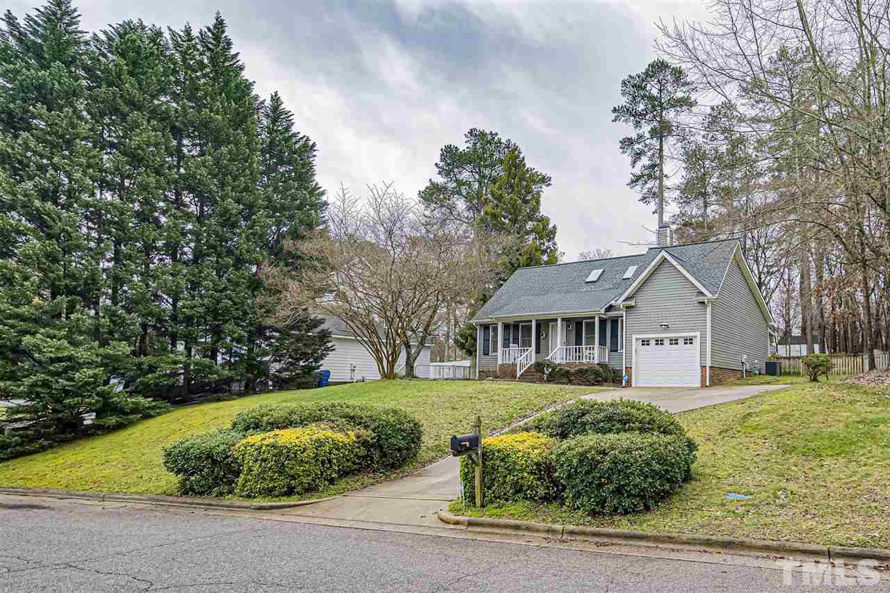 4248 Birmingham Way Raleigh, NC 27604 - Photo 3 of 29 a front view of a house with a yard