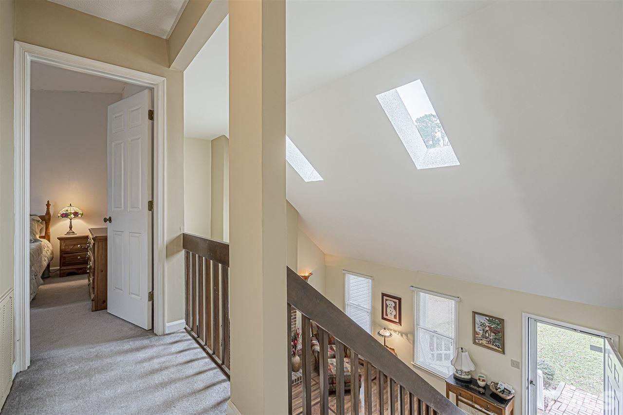 4248 Birmingham Way Raleigh, NC 27604 - Photo 22 of 29 a view of a livingroom from a hallway