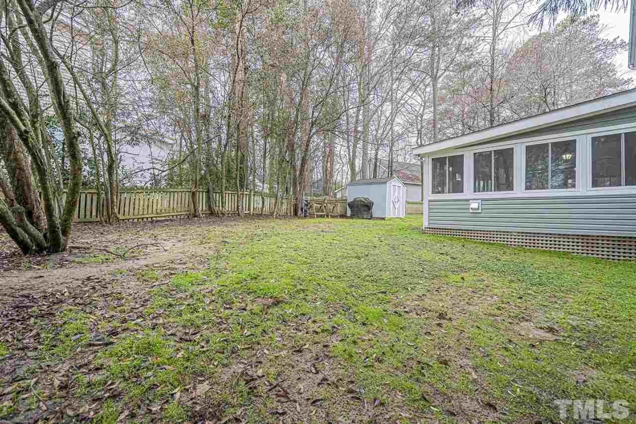 4248 Birmingham Way Raleigh, NC 27604 - Photo 29 of 29 a view of a house with a yard