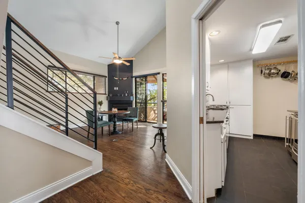 a view of a hallway view with living room and furniture