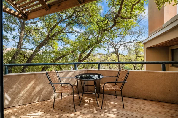 a view of a chairs and table in the terrace