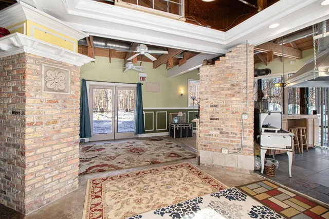 a kitchen with wooden cabinets and a stove top oven