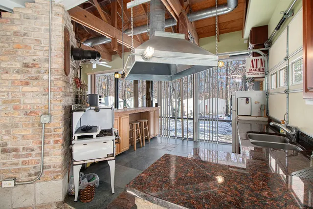 a view of a livingroom with washer and dryer