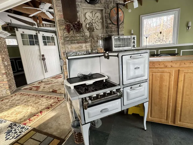 a view of a room with a large window