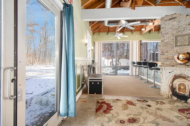 a view of a backyard with sitting area