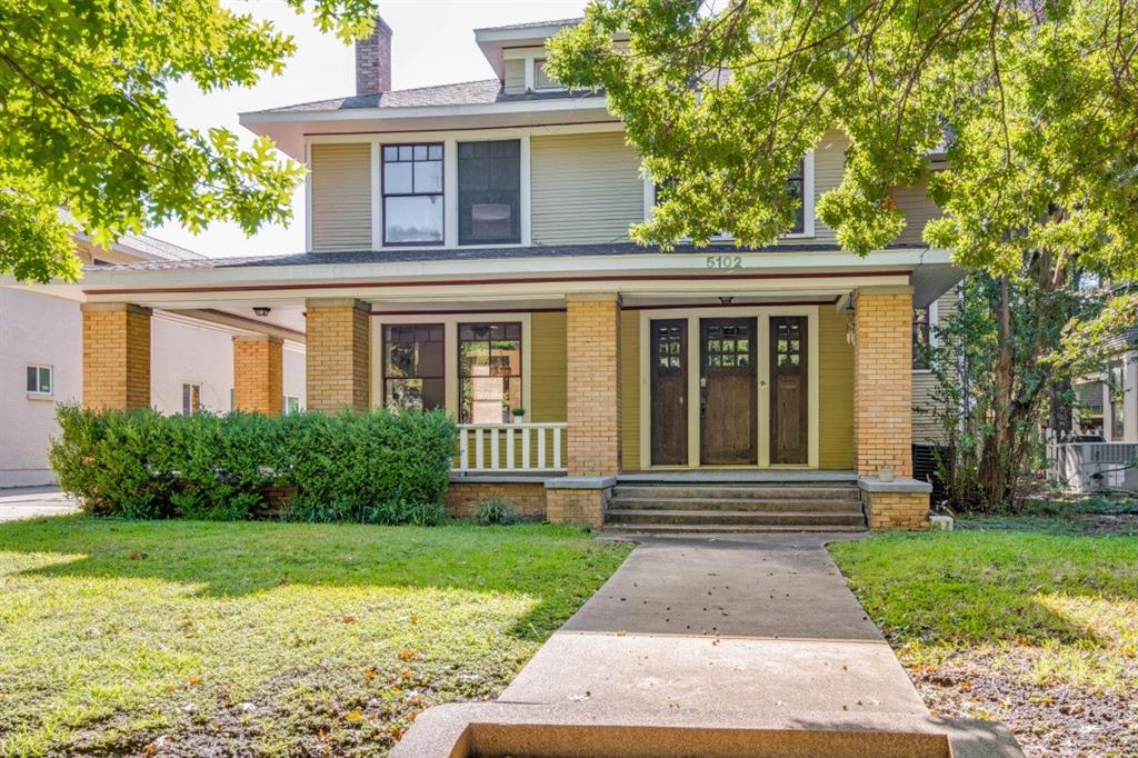 front view of house with a yard