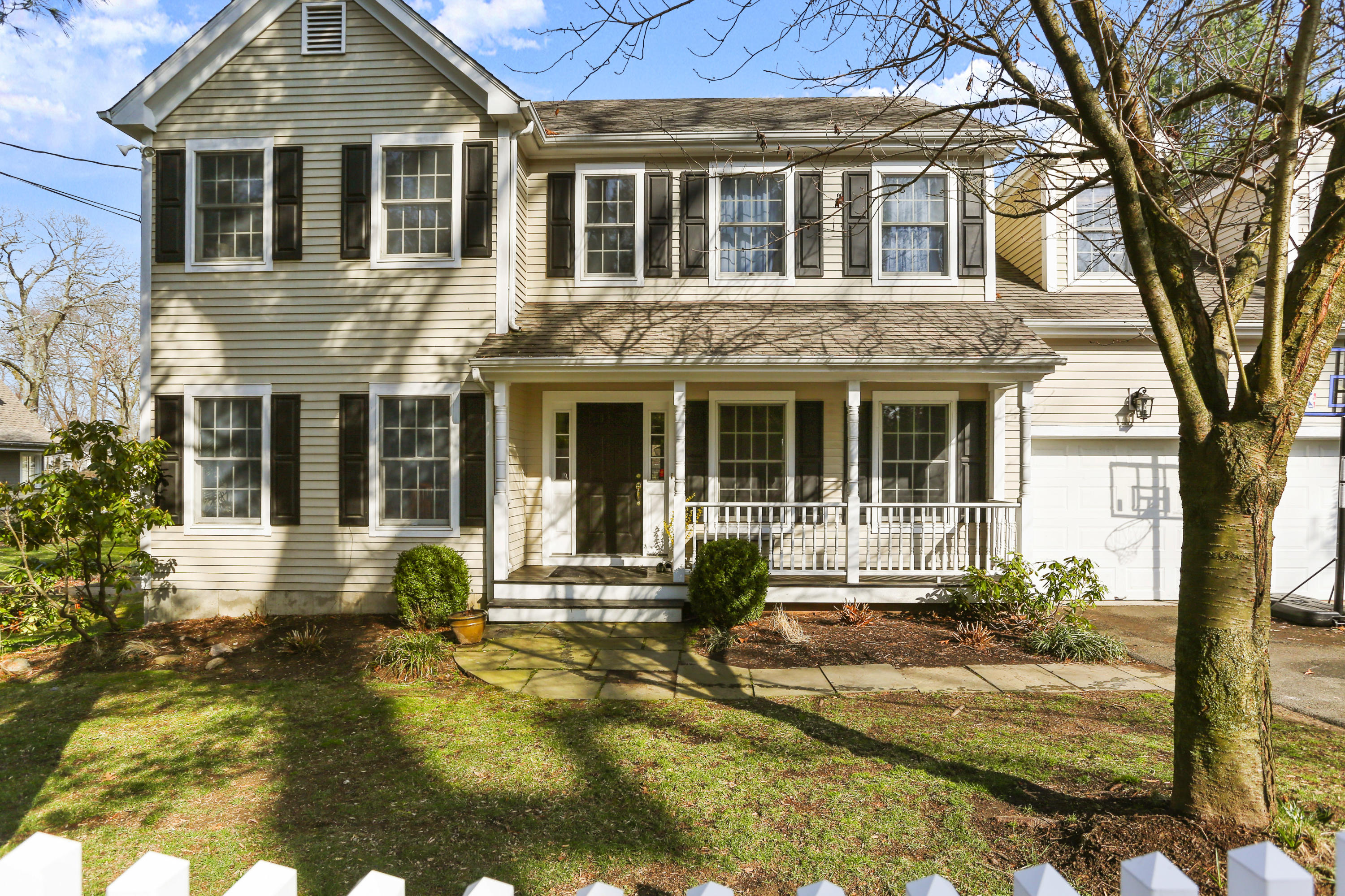 2 Old Field Road Norwalk, CT 06853 - Photo 1 of 23 a front view of a house with a yard