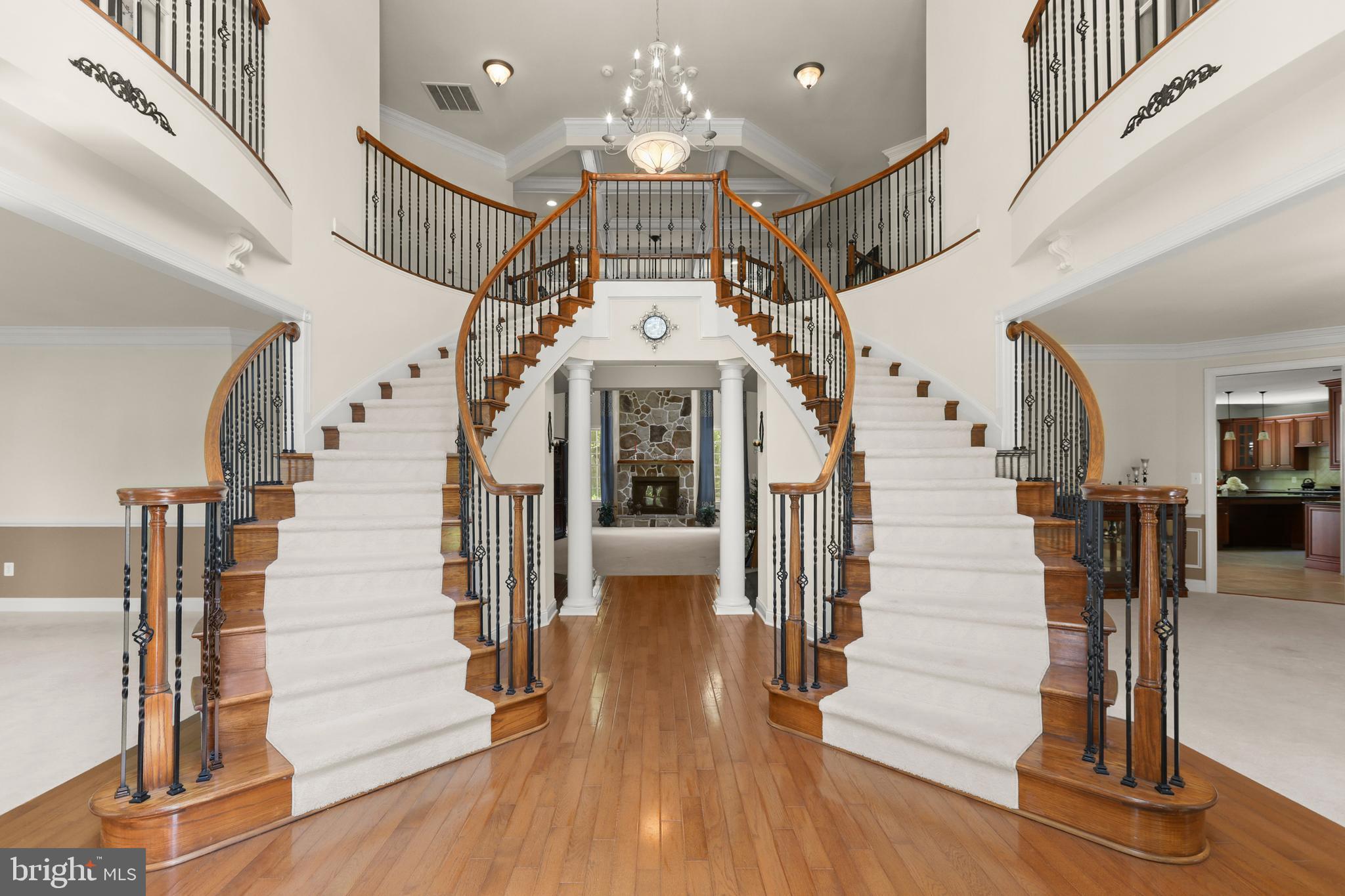 1601 Rushing Stream Court Forest Hill, MD 21050 - Photo 13 of 72 Foyer with dual curved staircase with runner