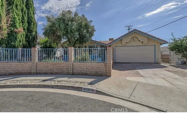 a view of backyard of house