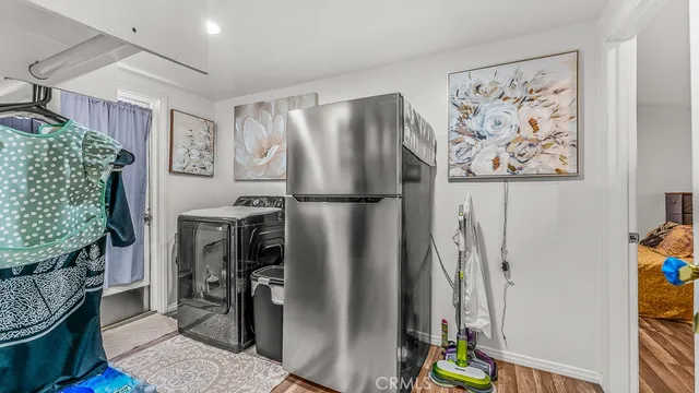 a view of a porch with furniture and a table