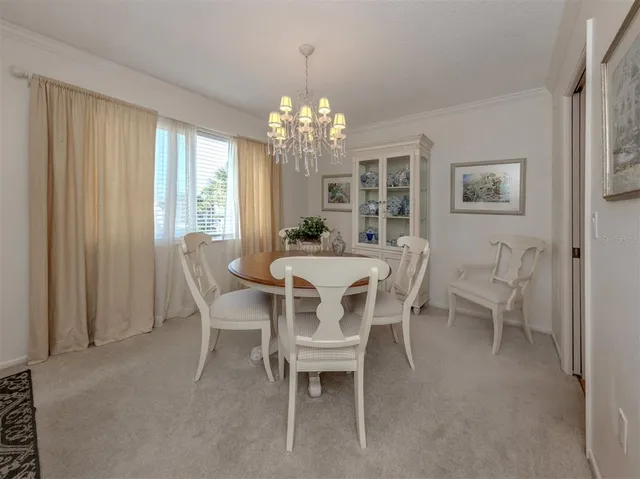 a spacious bedroom with a bed and a dresser