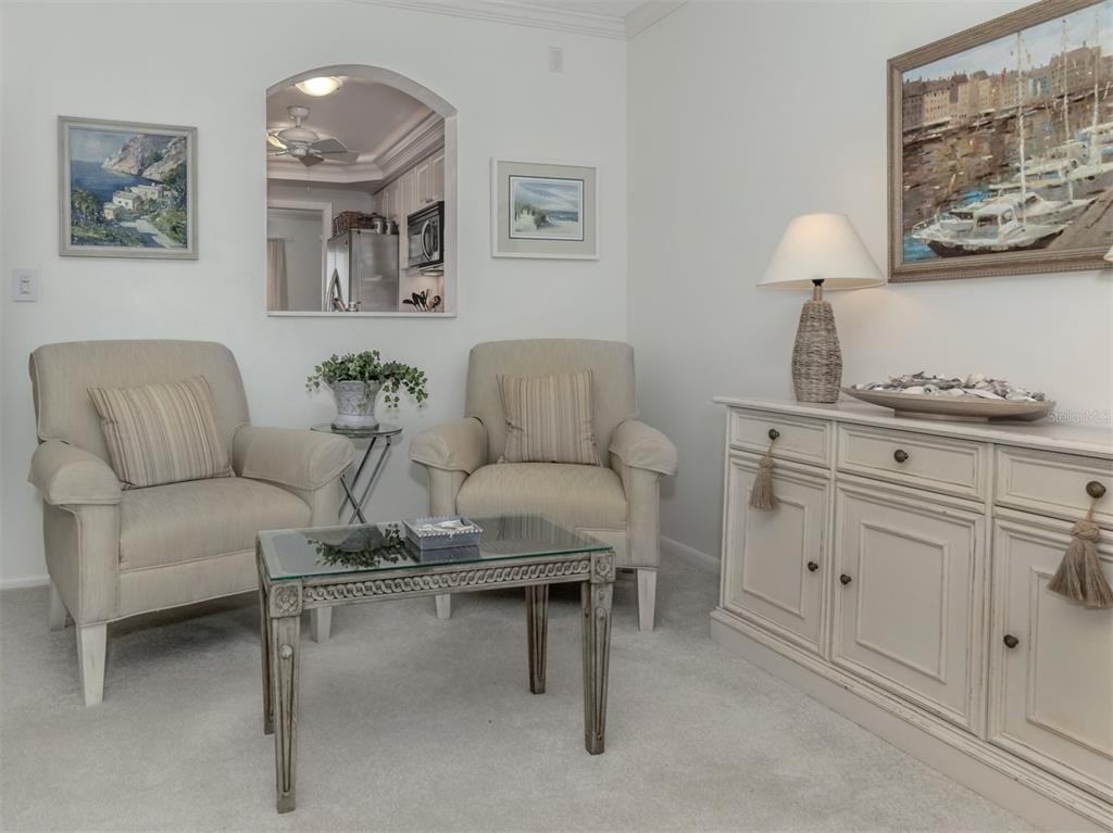 230 Santa Maria Street, Unit 330 Venice, FL 34285 - Photo 33 of 59 a living room with furniture