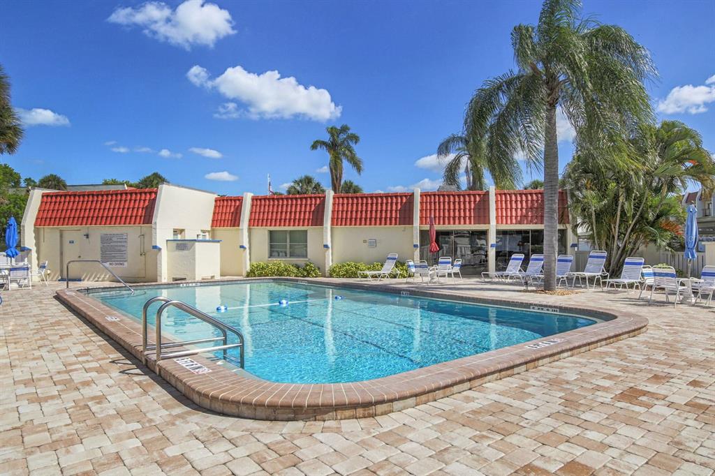 230 Santa Maria Street, Unit 330 Venice, FL 34285 - Photo 40 of 59 a view of a swimming pool and a terrace