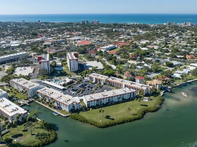 a view of a hallway with windows