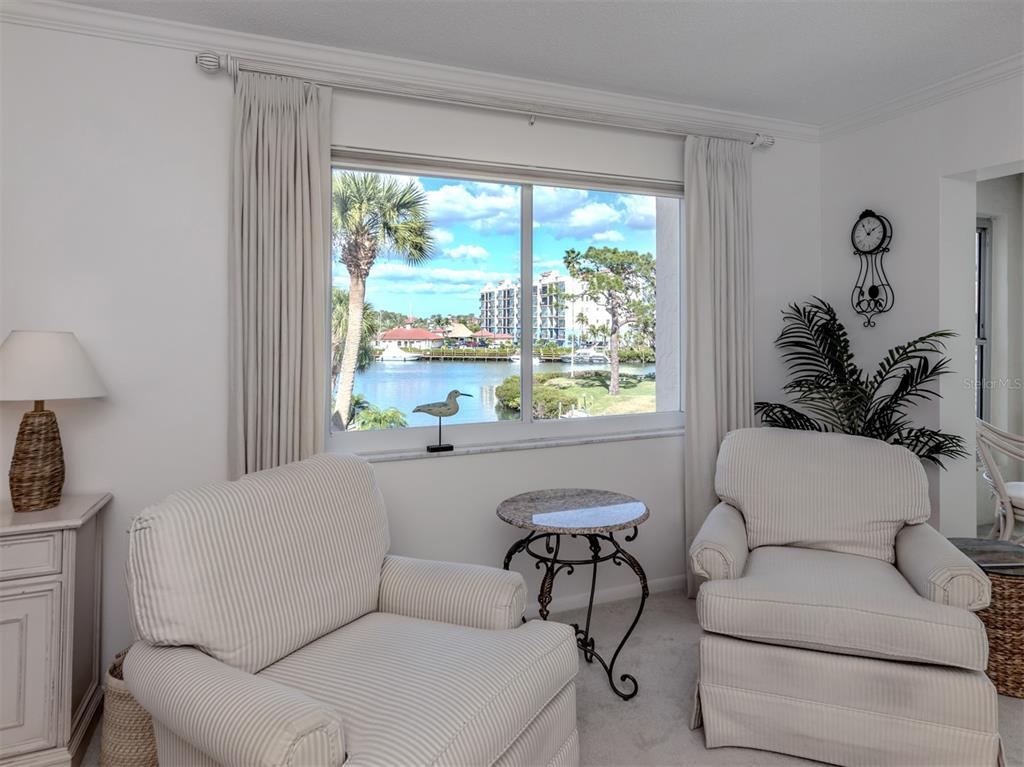 230 Santa Maria Street, Unit 330 Venice, FL 34285 - Photo 5 of 59 a living room with furniture and a window