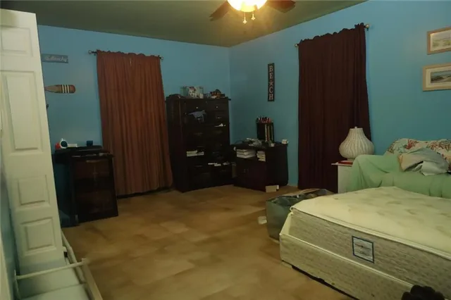 a bedroom with a bed and a closet