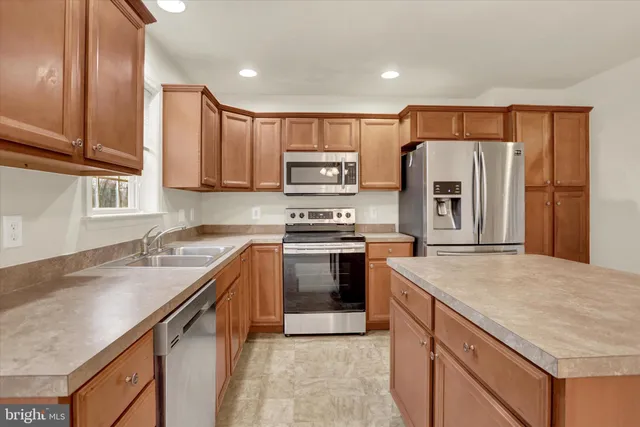 a view of a hallway with chandelier