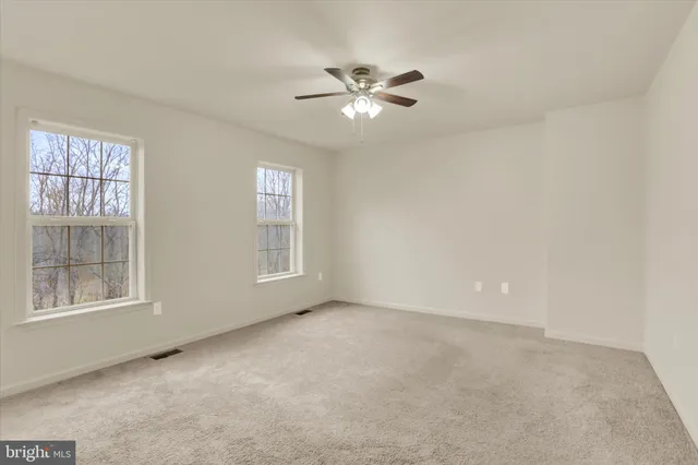 a view of small space with racks on the wall