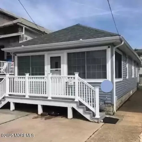 a view of a deck with a fence