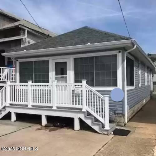 a view of a deck with a fence