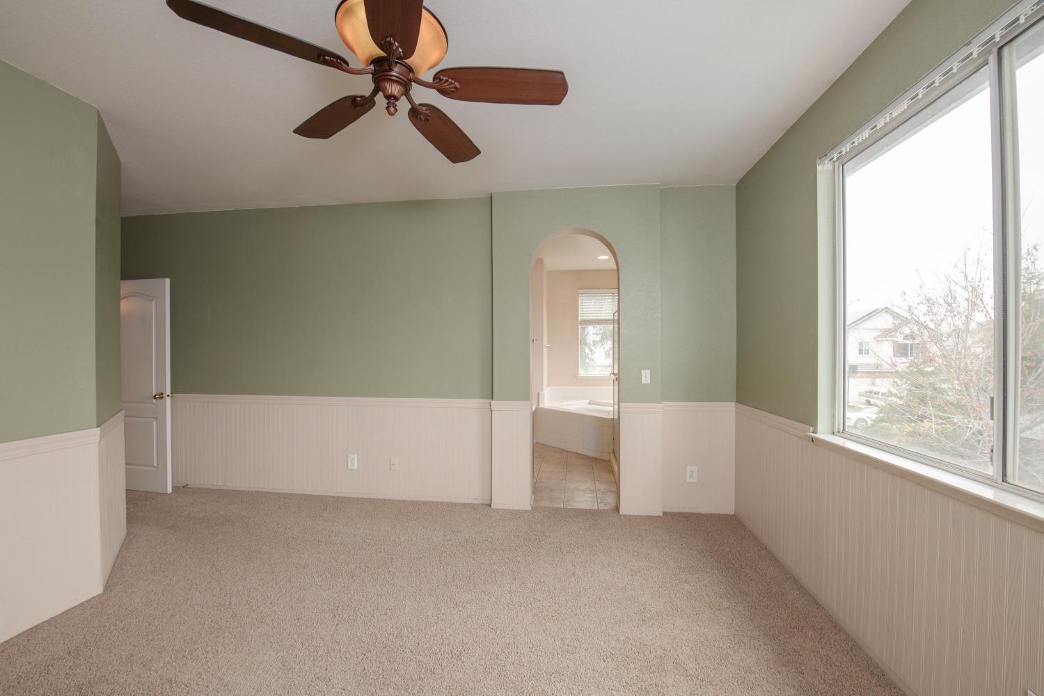 1361 Birch Avenue Clovis, CA 93611 - Photo 35 of 43 a view of an empty room with a window