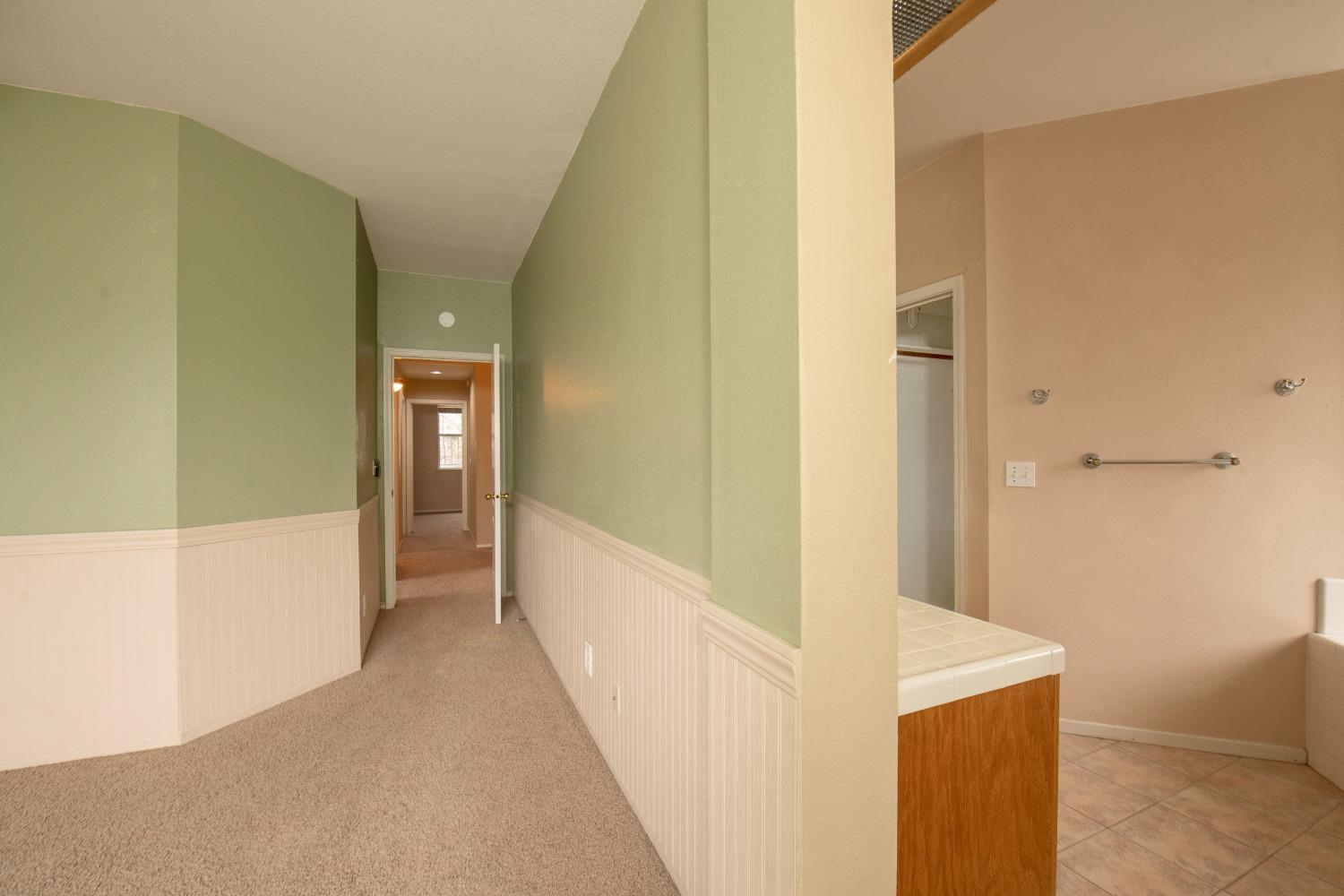 1361 Birch Avenue Clovis, CA 93611 - Photo 36 of 43 a view of a hallway with wooden floor