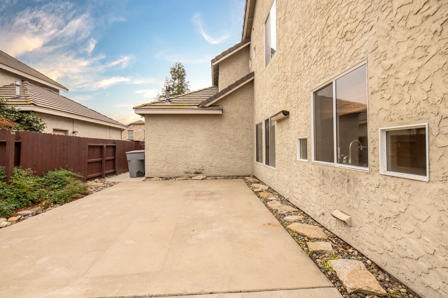 1361 Birch Avenue Clovis, CA 93611 - Photo 10 of 43 a front view of a house with a yard