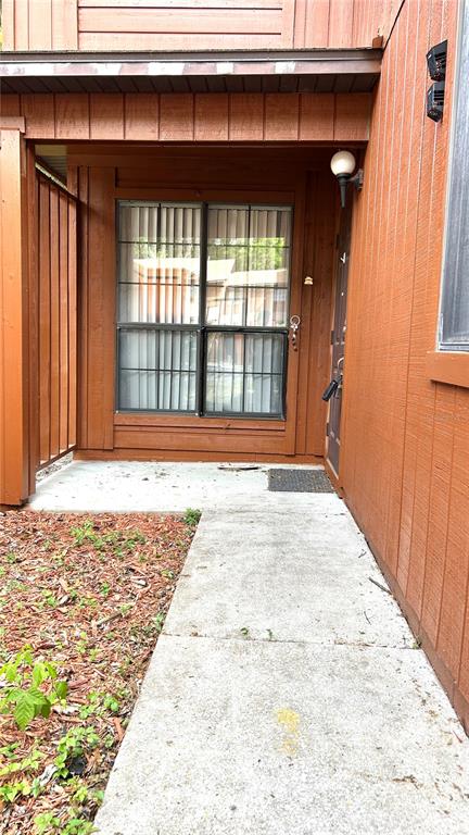 5855 Southwest 8th Place Gainesville, FL 32607 - Photo 2 of 19 a view of front door of house