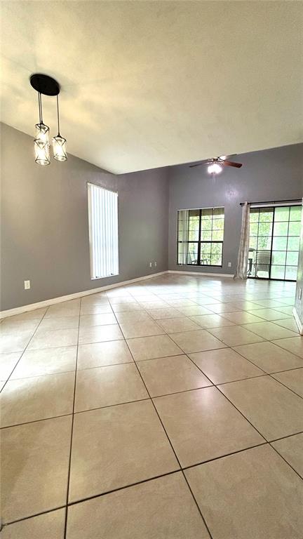 5855 Southwest 8th Place Gainesville, FL 32607 - Photo 6 of 19 a view of an empty room with a window