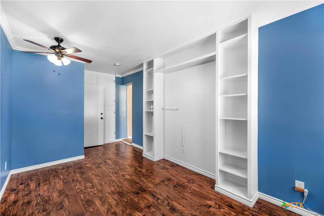 121 Bonham Street Port Lavaca, TX 77979 - Photo 17 of 26 a view of room with a ceiling fan