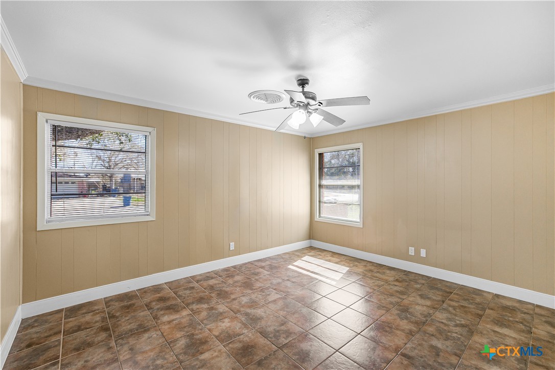 121 Bonham Street Port Lavaca, TX 77979 - Photo 10 of 26 a view of an empty room with a window