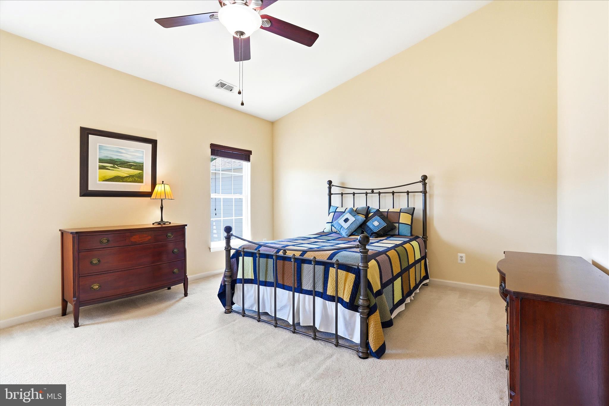 9009 Bealls Farm Road Frederick, MD 21704 - Photo 17 of 41 a bedroom with a bed and a chandelier