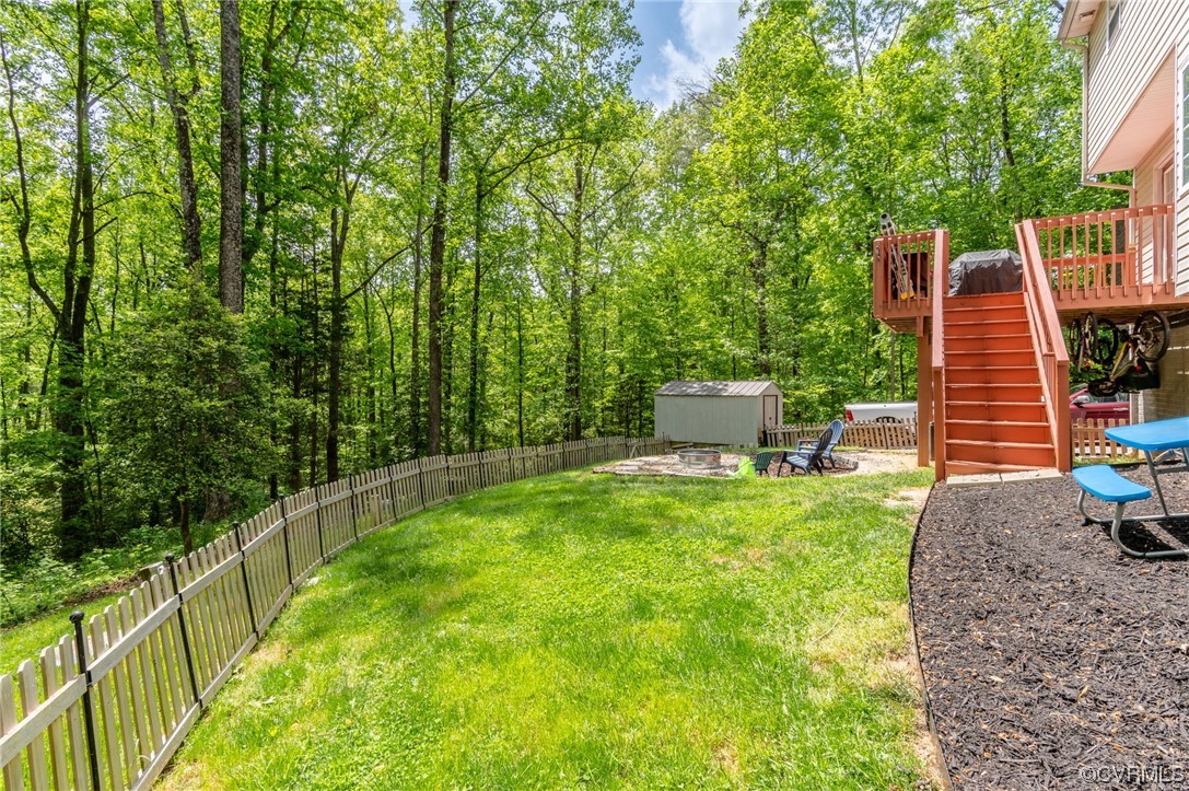 353 Nottoway Lane King William, VA 23086 - Photo 16 of 33 a view of a backyard with sitting area