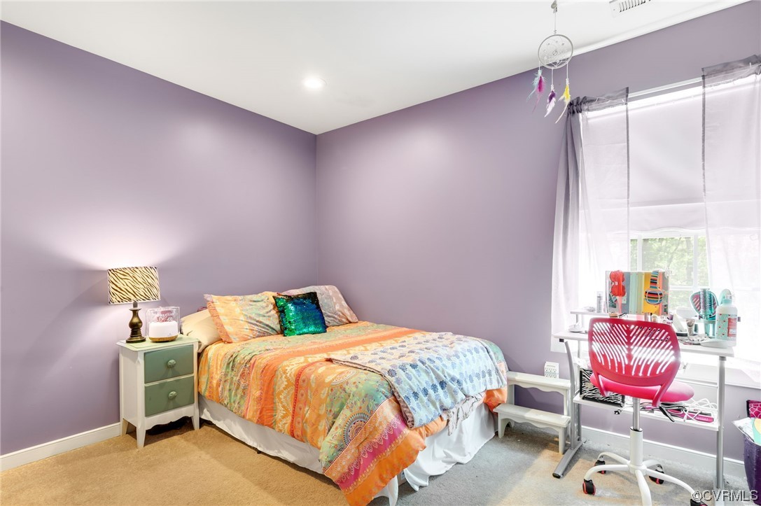 353 Nottoway Lane King William, VA 23086 - Photo 24 of 33 a bedroom with a bed and a window