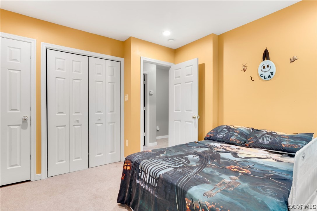 353 Nottoway Lane King William, VA 23086 - Photo 26 of 33 a bedroom with a bed and a painting on the wall