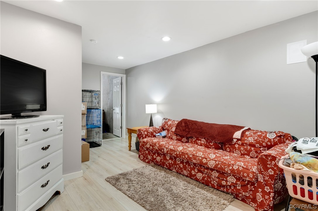 353 Nottoway Lane King William, VA 23086 - Photo 28 of 33 a living room with furniture and a flat screen tv
