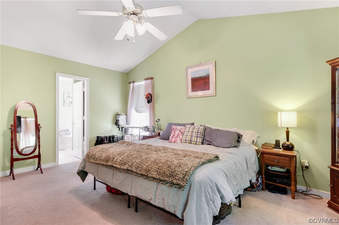 353 Nottoway Lane King William, VA 23086 - Photo 9 of 33 a bedroom with a bed a dresser and potted plant