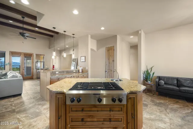 a view of a living room and kitchen