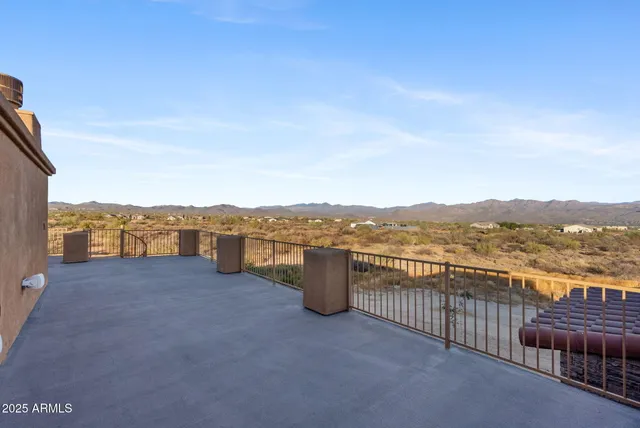 a view of a terrace with a city view