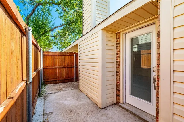 a view of a house with a backyard and stairs