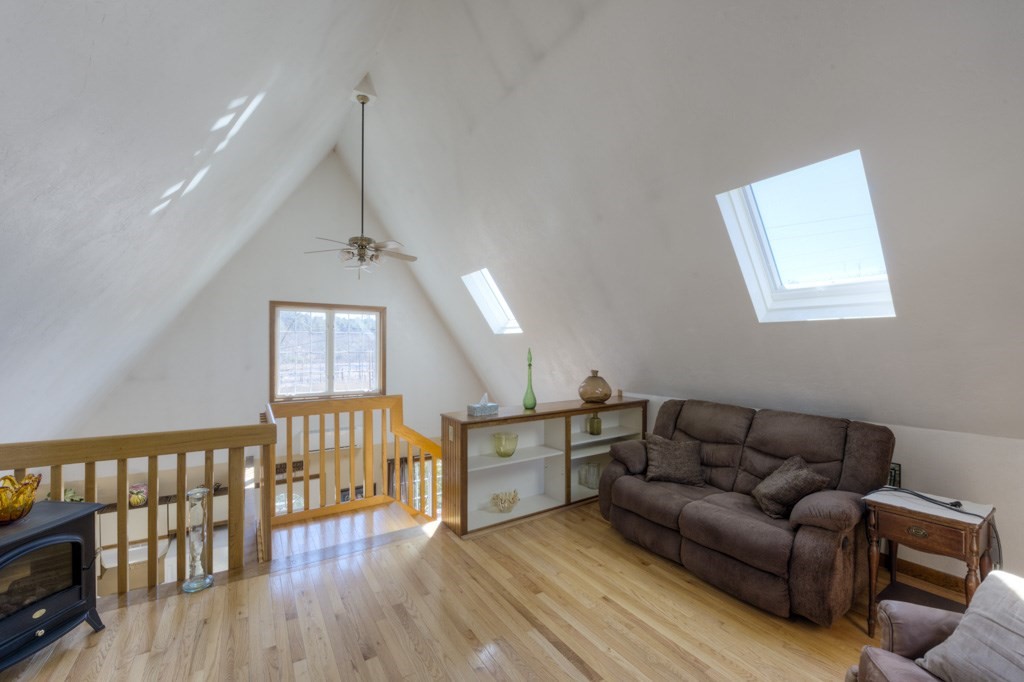 51 Webber Road Brookfield, MA 01506 - Photo 26 of 42 a living room with furniture and wooden floor