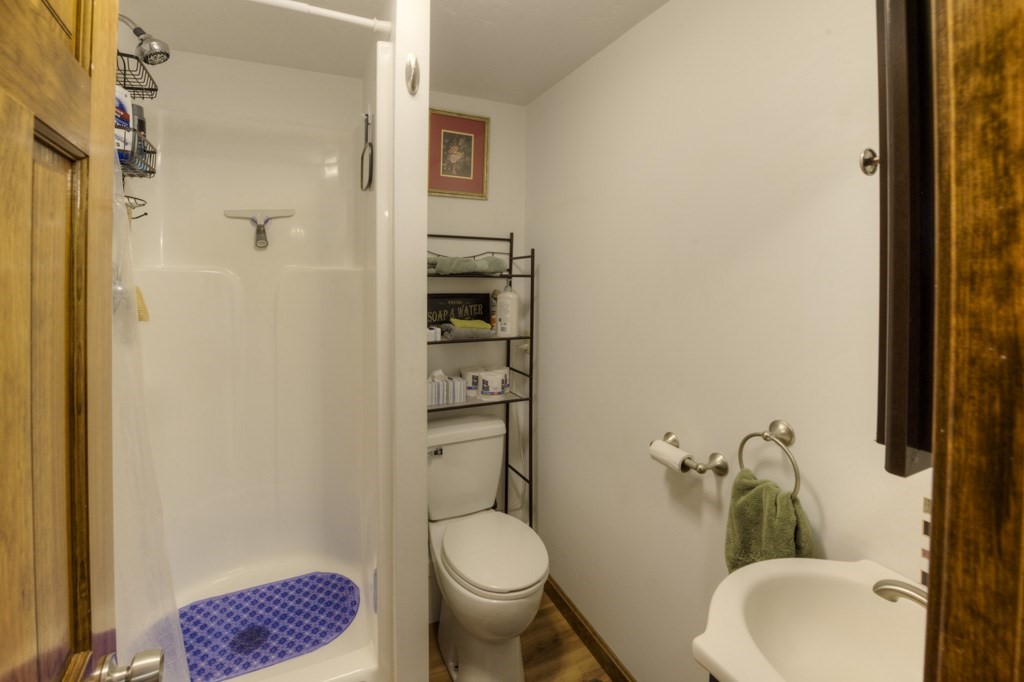 51 Webber Road Brookfield, MA 01506 - Photo 29 of 42 a bathroom with a toilet and a shower