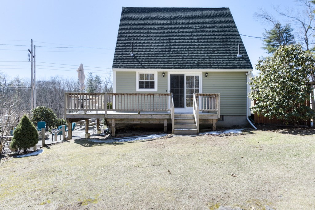 51 Webber Road Brookfield, MA 01506 - Photo 38 of 42 a view of a house with a yard and sitting area