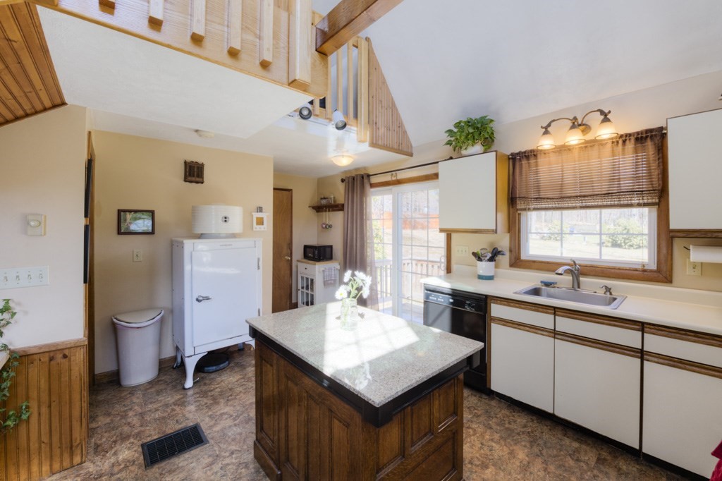 51 Webber Road Brookfield, MA 01506 - Photo 6 of 42 a kitchen with stainless steel appliances granite countertop a sink a stove and a refrigerator