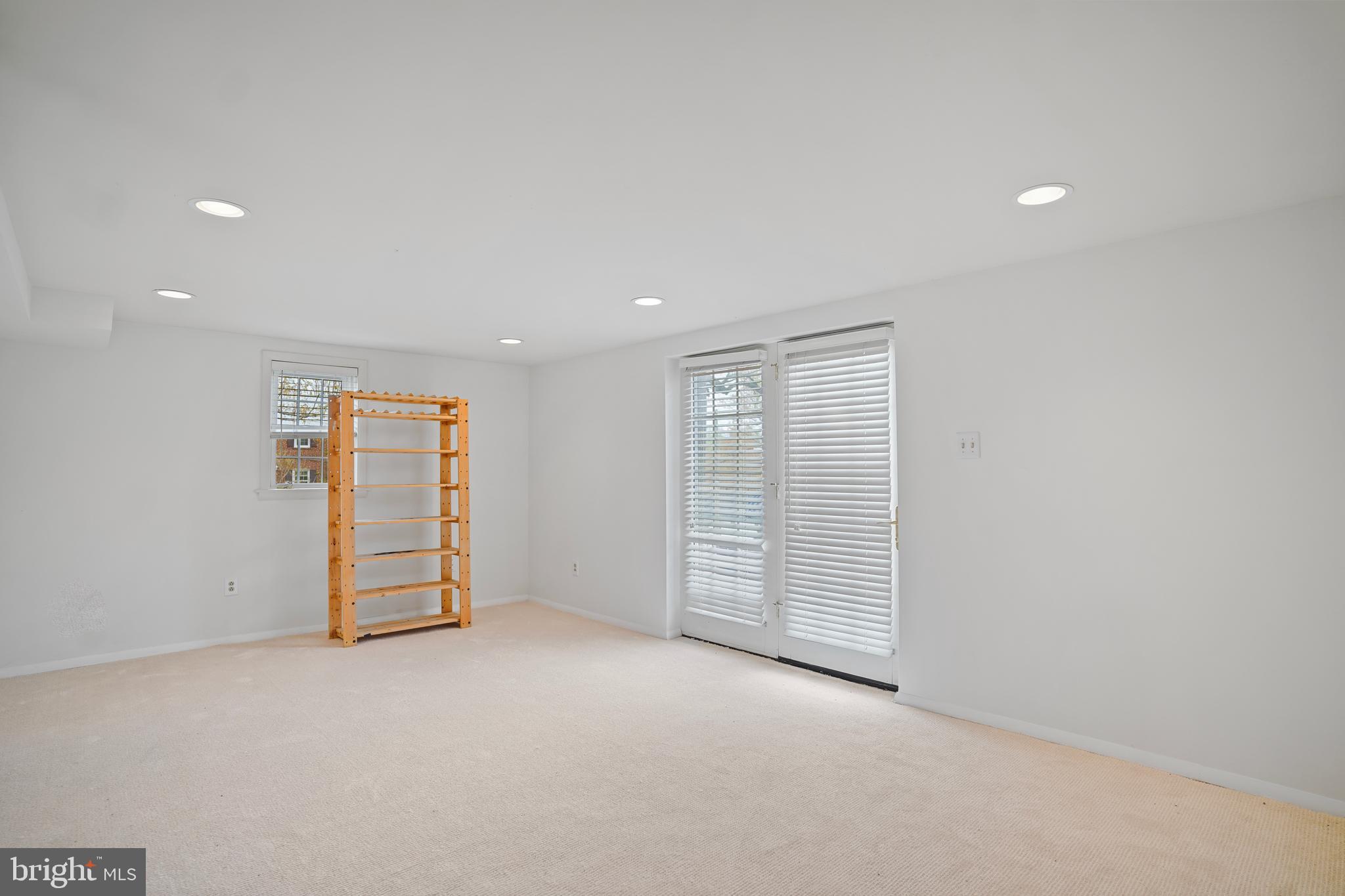 322 Penwood Road Silver Spring, MD 20901 - Photo 15 of 23 Lower level living space with walkout.