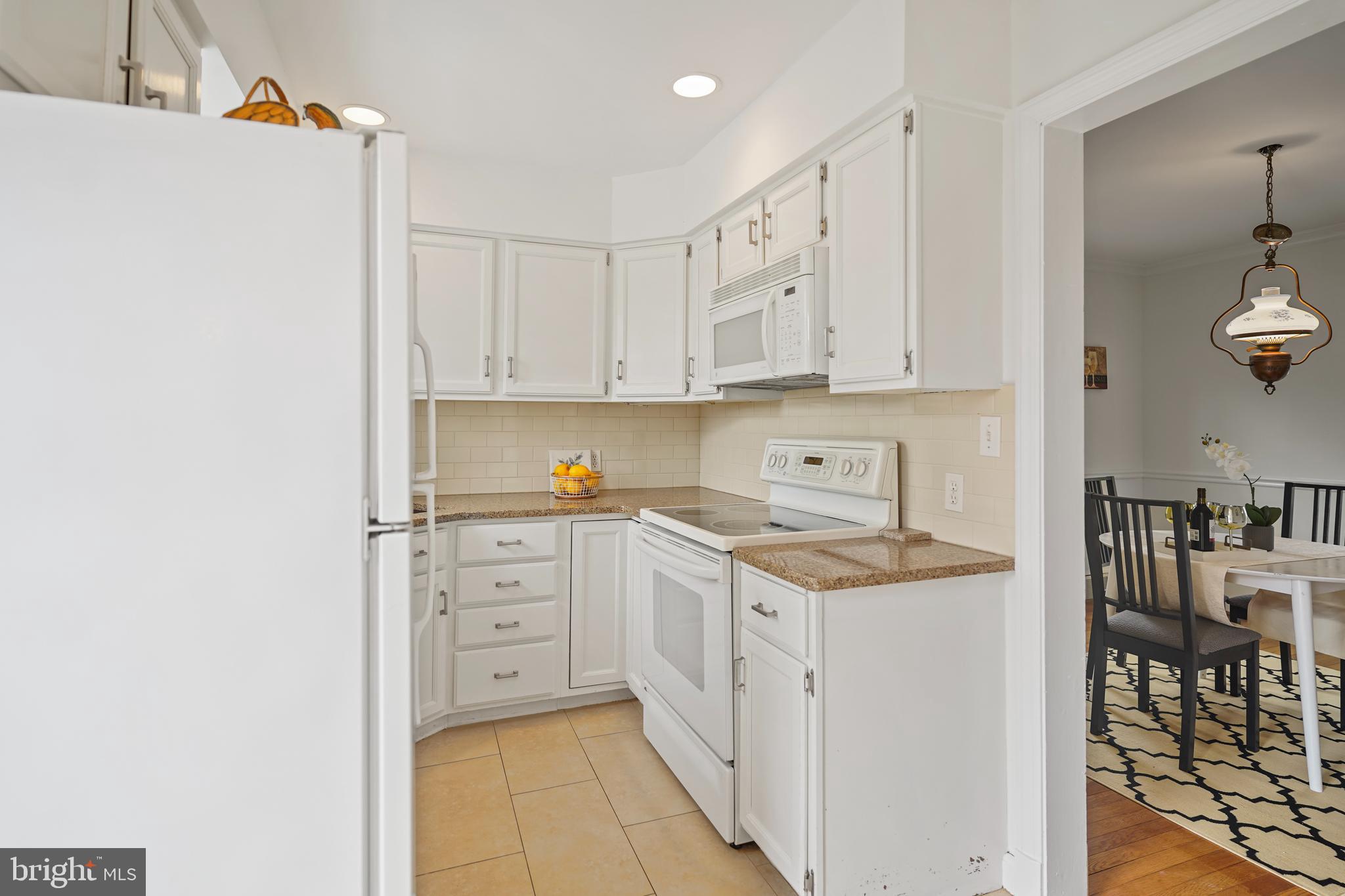 322 Penwood Road Silver Spring, MD 20901 - Photo 9 of 23 Kitchen with recessed lighting.