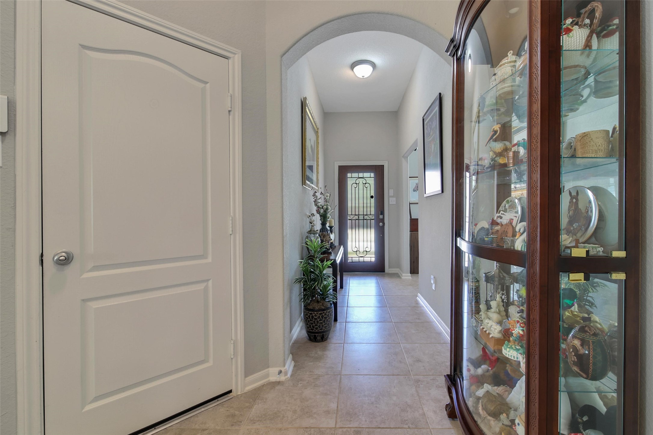 214 Pleasant Hill Way Conroe, TX 77304 - Photo 6 of 43 Enter through the wood and glass front door into the spacious entry.